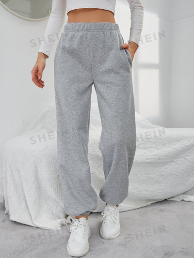 Solid Elastic Waist Slant Pocket Sweatpants